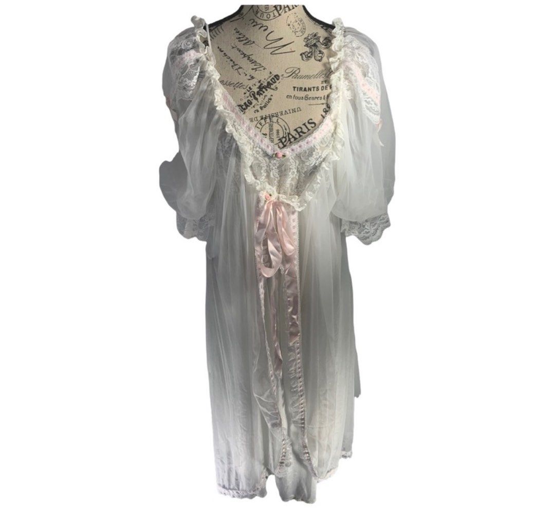 [SOLD] vintage lingerie set (Category: Undergarments & Loungewear) located in Urdaneta. Submitted by thriftsbyfelas (Listing ID 1281777951, Image 3). Description: - Mesh robe with pink ribbon on the sleeves and down the center of the robe. Puffy sleeves. - Tie in the front of the robe. - Long Slip. - The chest part is made of lace see through material and the body is a thin soft nylon. - Slightly see through - Sell online $100-$300 - Size: Medium