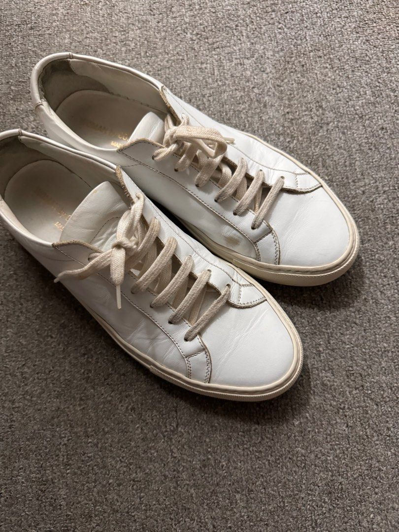 Woman by Common Projects Achilles Low (Category: Sneakers) located in Makati City. Submitted by nisayaptinchay (Listing ID 1281728855, Image 1). Description: Woman by Common Projects Achilles Low (White) Size: 38 Well Used with Wear & Tear (Please see photos for close ups) Just needs a little cleaning Bought from Lane Crawford HK Brand new costs P26,000 No more box and dustbags.