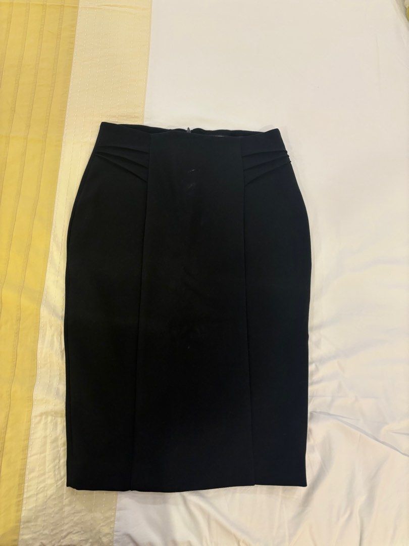 Zara - black pencil skirt (Category: Skirts) located in Quezon City. Submitted by wtrey (Listing ID 1281683937, Image 1). Description: Zara - basic black pencil skirt. Size XS.