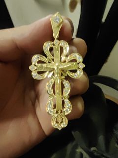 18k crucifix pendant with total of 1.5 carat diamonds