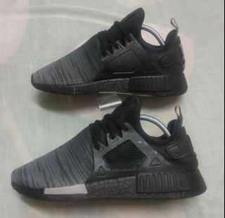 Nmd xr1 best sale triple black malaysia