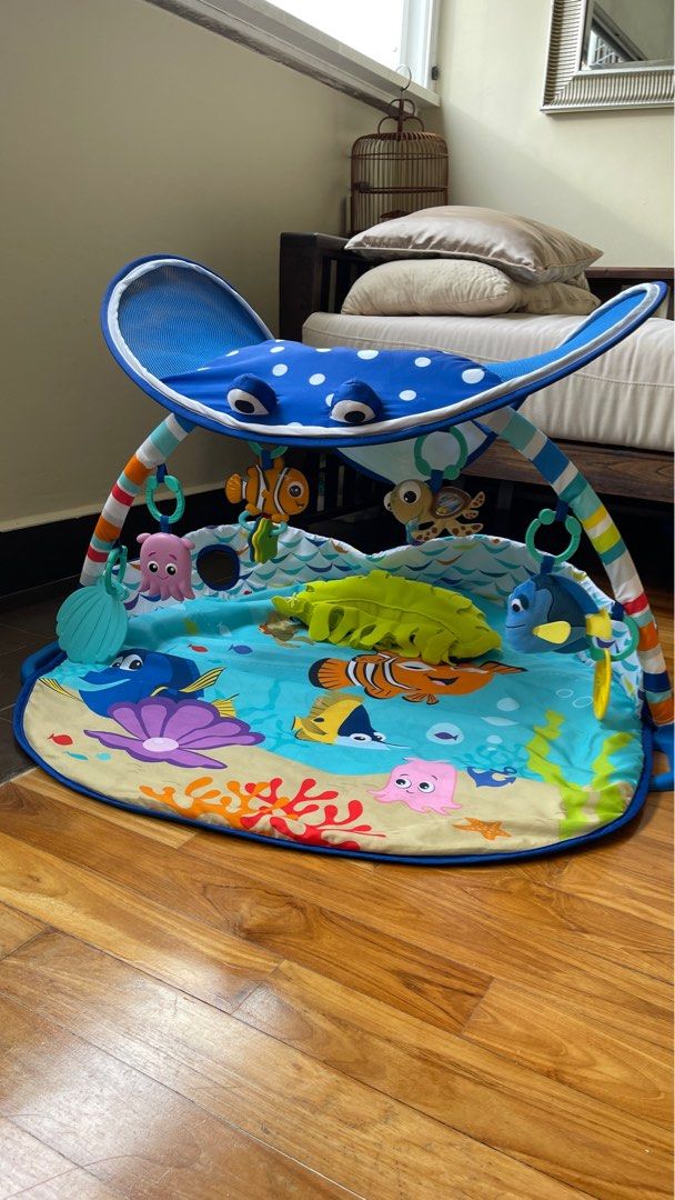 Bright starts mr ray ocean lights activity gym top