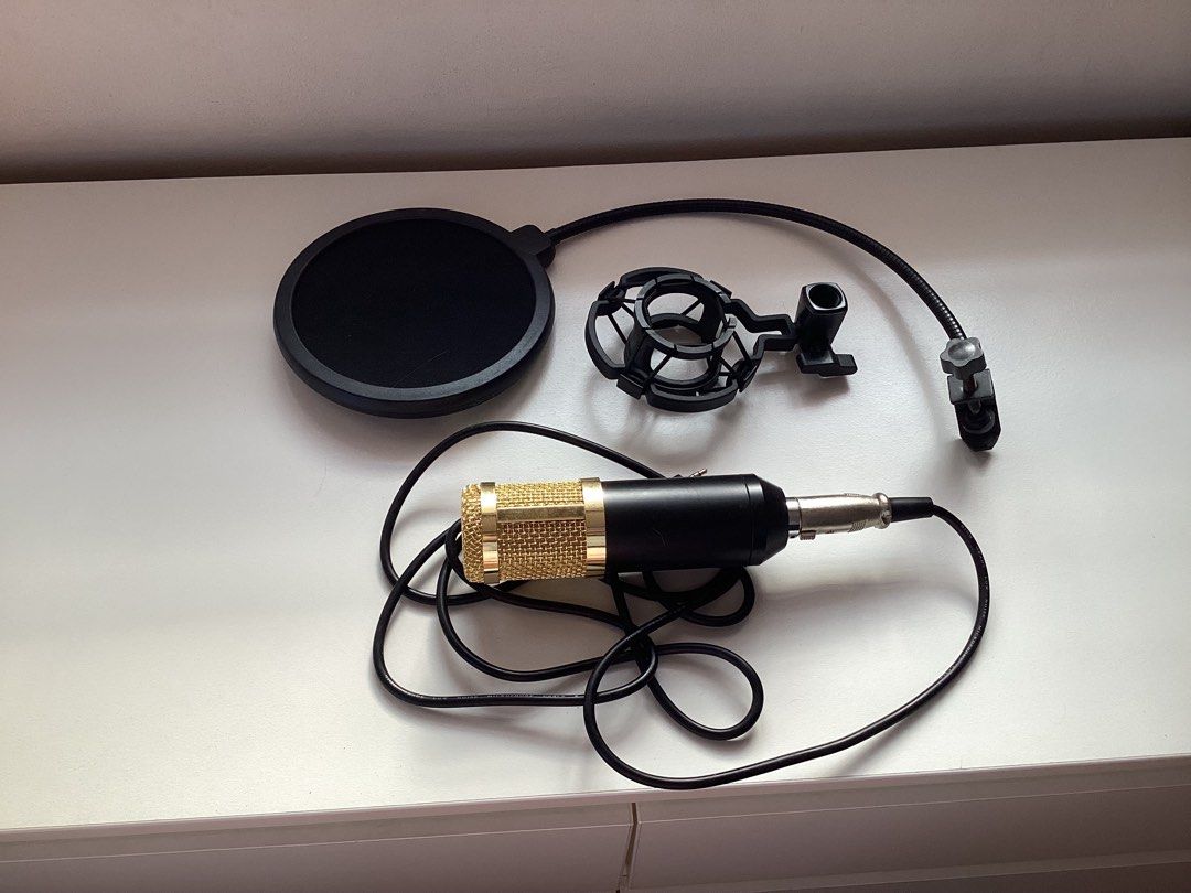 Defective BM800 Condenser Microphone with Pop Filter and Mic Holder (Category: Microphones) located in Manila. Submitted by vanicchi (Listing ID 1281884213, Image 2). Description: Inclusions: - BM800 (Defective) - Pop Filter (barely used) - Mic Holder.