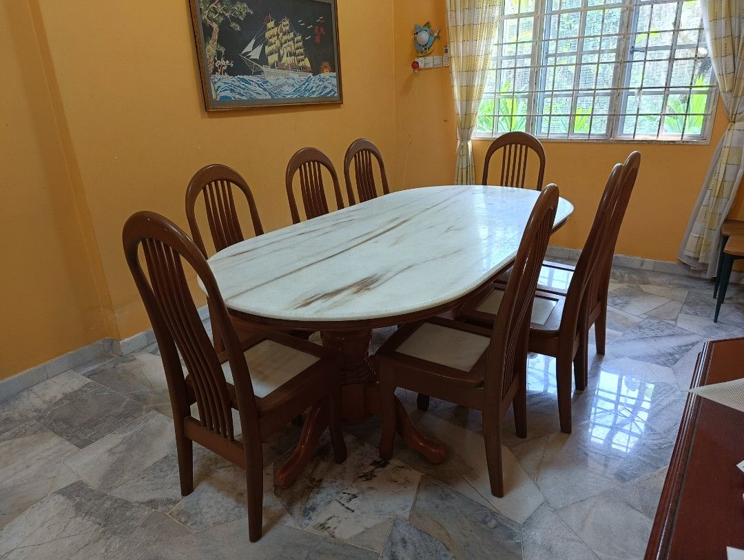 Marble table (Category: Tables & Sets) located in Kuala Lumpur. Submitted by monkeynuts (Listing ID 1281844157, Image 2). Description: 8 seater marble dining or meeting table. Tabletop could use sanding and refinishing. One of the chairs has a crack that can be repaired..