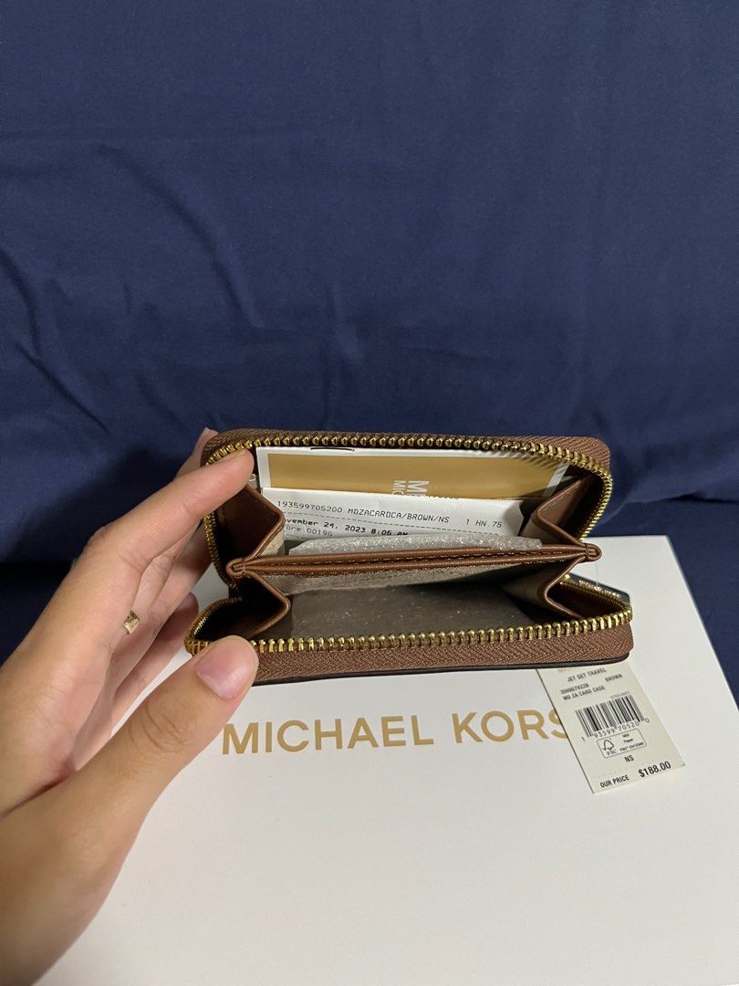Michael Kors MK Card Case Wallet in Brown (Category: Wallets & Card holders) located in Rizal. Submitted by pieces_mnl (Listing ID 1281980358, Image 3). Description: MK Jet Set Travel Card Case Wallet - Brand New - Color: Vanilla - With Original Price Tag - With Gift Receipt for proof of authenticity - Included Michael Kors Box Shipping shouldered by Buyer.