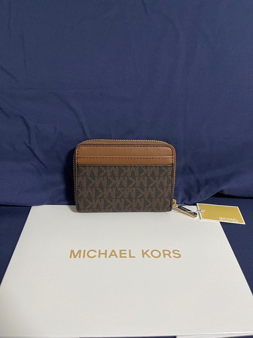 Michael Kors MK Card Case Wallet in Brown (Category: Wallets & Card holders) located in Rizal. Submitted by pieces_mnl (Listing ID 1281980358, Image 2). Description: MK Jet Set Travel Card Case Wallet - Brand New - Color: Vanilla - With Original Price Tag - With Gift Receipt for proof of authenticity - Included Michael Kors Box Shipping shouldered by Buyer.