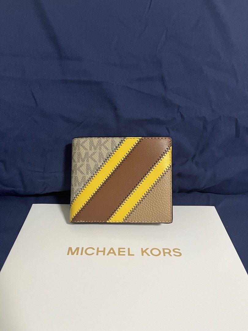 Michael Kors MK Unisex Bifold Wallet (Category: Wallets & Card holders) located in Rizal. Submitted by pieces_mnl (Listing ID 1281980852, Image 1). Description: o- Brand New - With Original Price Tag - With Gift Receipt for proof of authenticity - Included Michael Kors Box Shipping shouldered by Buyer.