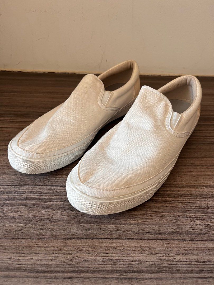 Muji Sneakers (Category: Sneakers) located in Muntinlupa City. Submitted by _sbstnm (Listing ID 1281884847, Image 2). Description: Muji slip on sneakers in white canvas size 29 (men's 11) and bought in Japan. Only worn once. RFS: wrong size, bought because luggage was lost. Issues: shoes have yellowing in the back. .