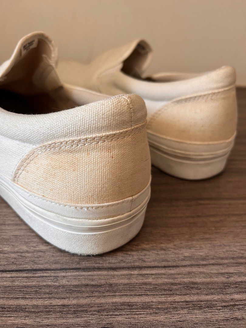 Muji Sneakers (Category: Sneakers) located in Muntinlupa City. Submitted by _sbstnm (Listing ID 1281884847, Image 3). Description: Muji slip on sneakers in white canvas size 29 (men's 11) and bought in Japan. Only worn once. RFS: wrong size, bought because luggage was lost. Issues: shoes have yellowing in the back. .