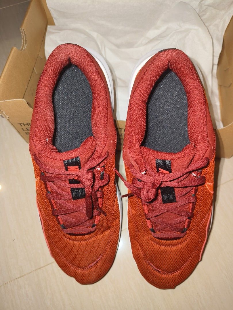 Nike Legend Essential 3 (Category: Sneakers) located in Manila. Submitted by rexign_ (Listing ID 1281867615, Image 3). Description: 100% Original - brand new - color: Red/Black/Cave Purple/Bright Crimson - please see sticker on box (last picture) for the accurate size - from PHP 2,995 original price - comes with the box.