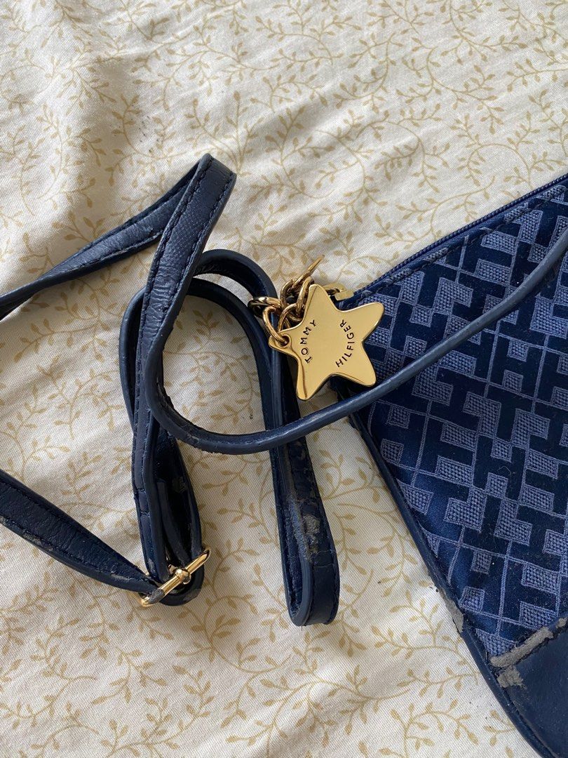 Tommy Hilfiger blue crossbody bag (Category: Luxury Bags & Wallets) located in Cainta. Submitted by cbe23 (Listing ID 1281825704, Image 2). Description: Preloved Adjustable strap With signs of usage.