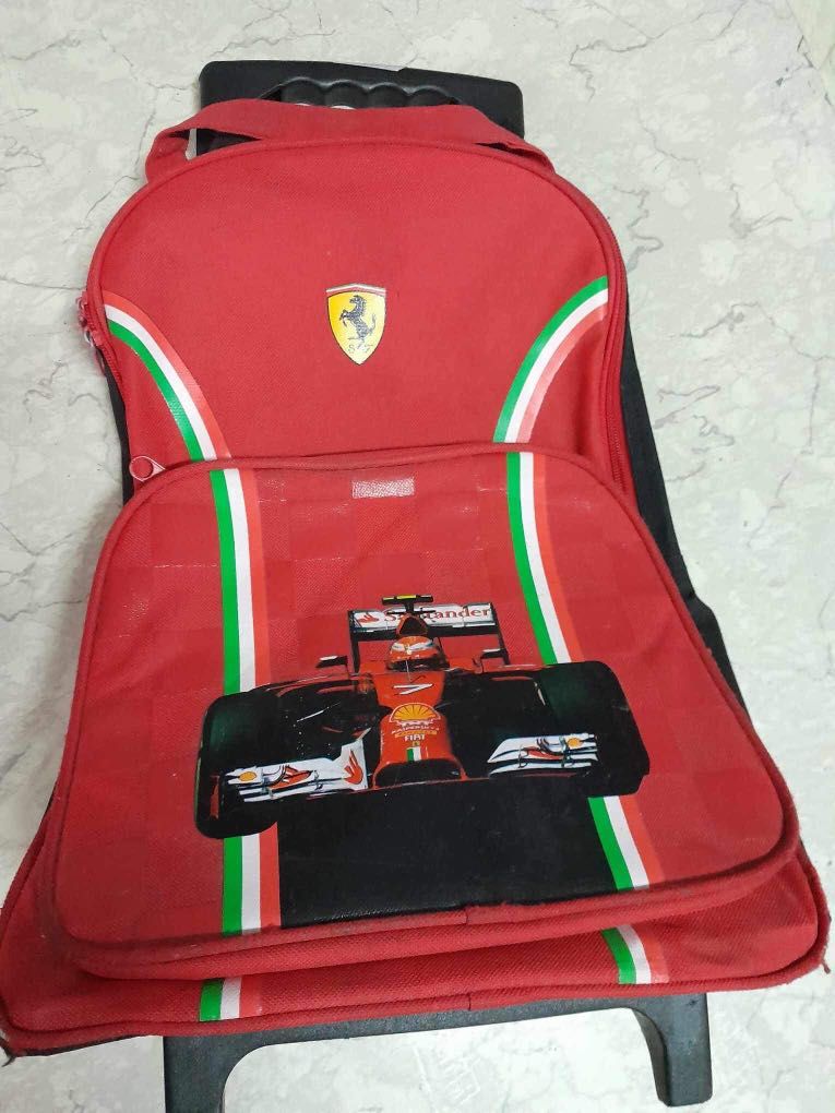 Trolley bag ferrari Hobbies Toys Travel Luggage on Carousell