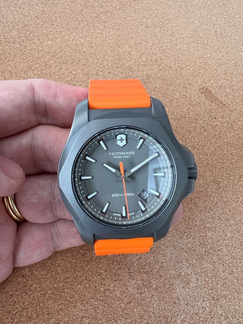 Victorinox inox titanium orange top