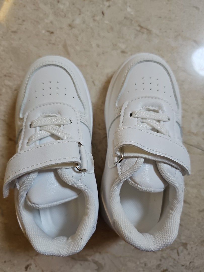 White covered sports shoes