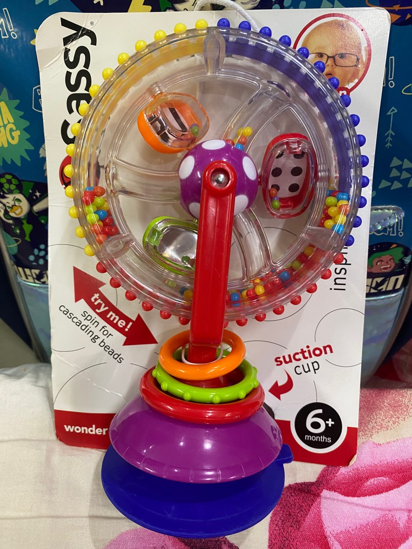 Sassy developmental wonder shop wheel suction toy