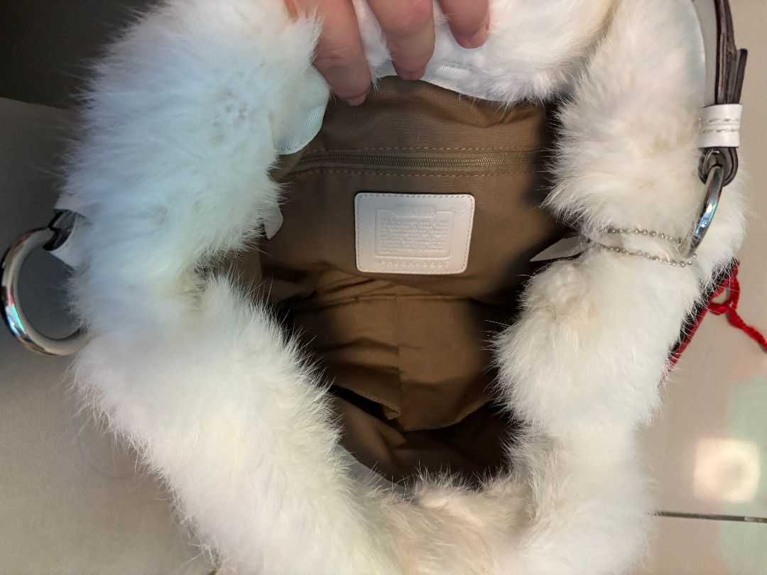 Coach purse best sale with fur trim