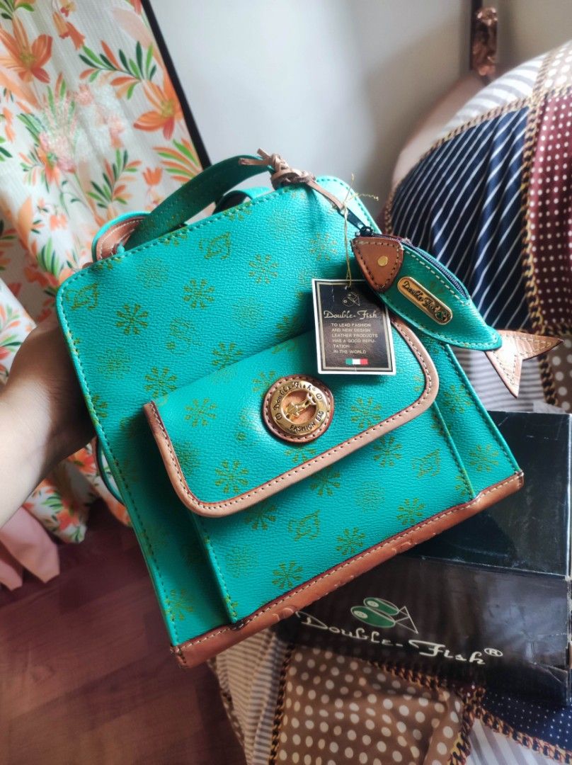 Double fish (Category: Luxury Bags & Wallets) located in Zamboanga. Submitted by Clairey03 (Listing ID 1282153624, Image 1). Description: Brandnew 2way backpack or shoulder bag.