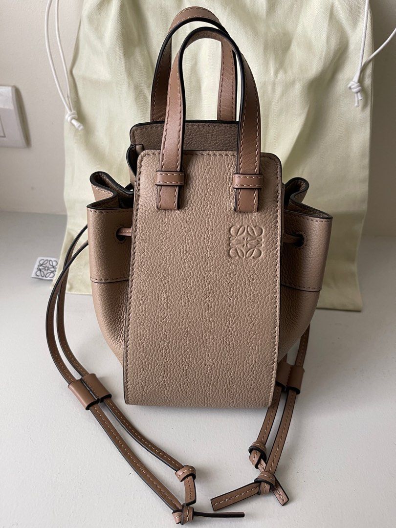 LOEWE Hammock DW Mini Bag (Category: Luxury Bags & Wallets) located in Pasig City. Submitted by angel_10 (Listing ID 1282142716, Image 3). Description: ~ Loewe 💯 guaranteed authentic ~ almost new / pristine condition ~ bought in Barcelona 🇪🇸 ~ used once only in 🇮🇹 ~ Mini Hammock Drawstring Bag ~ Soft grain calfskin exterior ~ Shoulder, crossbody or top handle carry ~ Detachable and adjustable strap ~ Herringbone cotton canvas lining ~ Emboss