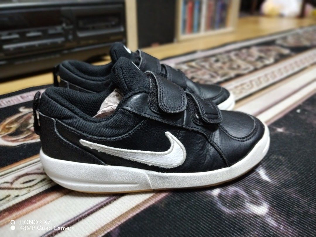 Nike pico 4 outlet v junior boys trainers