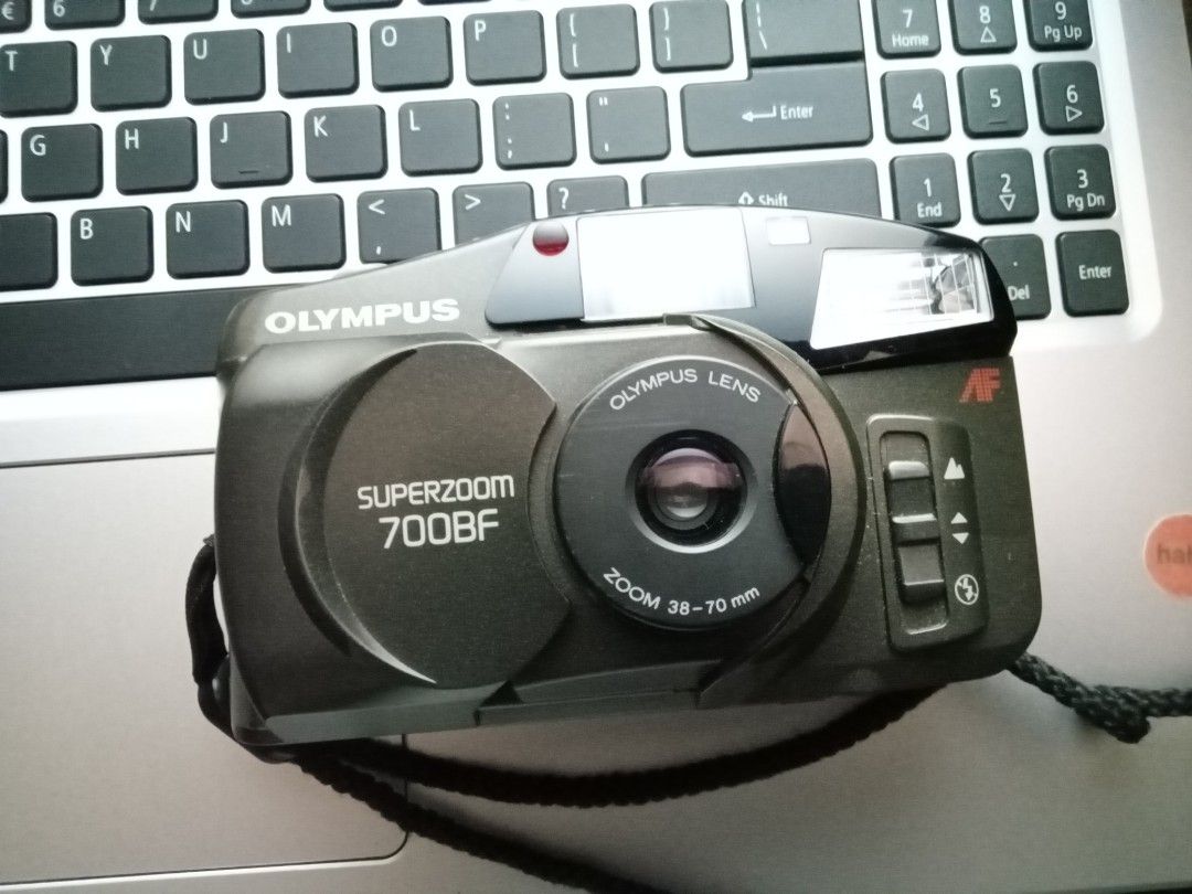Olympus Superzoom 700BF (Category: Cameras) located in Manila. Submitted by squeedler (Listing ID 1282109865, Image 1). Description: needs repairing!! it still works, but it randomly turns off sometimes. flash working. 10 sec. timer working. haven't tested it with 35mm film. battery: 2 AA batteries (not included) inclusions: camera pouch camera buy at your own risk no return/refund will post more pics later!!.