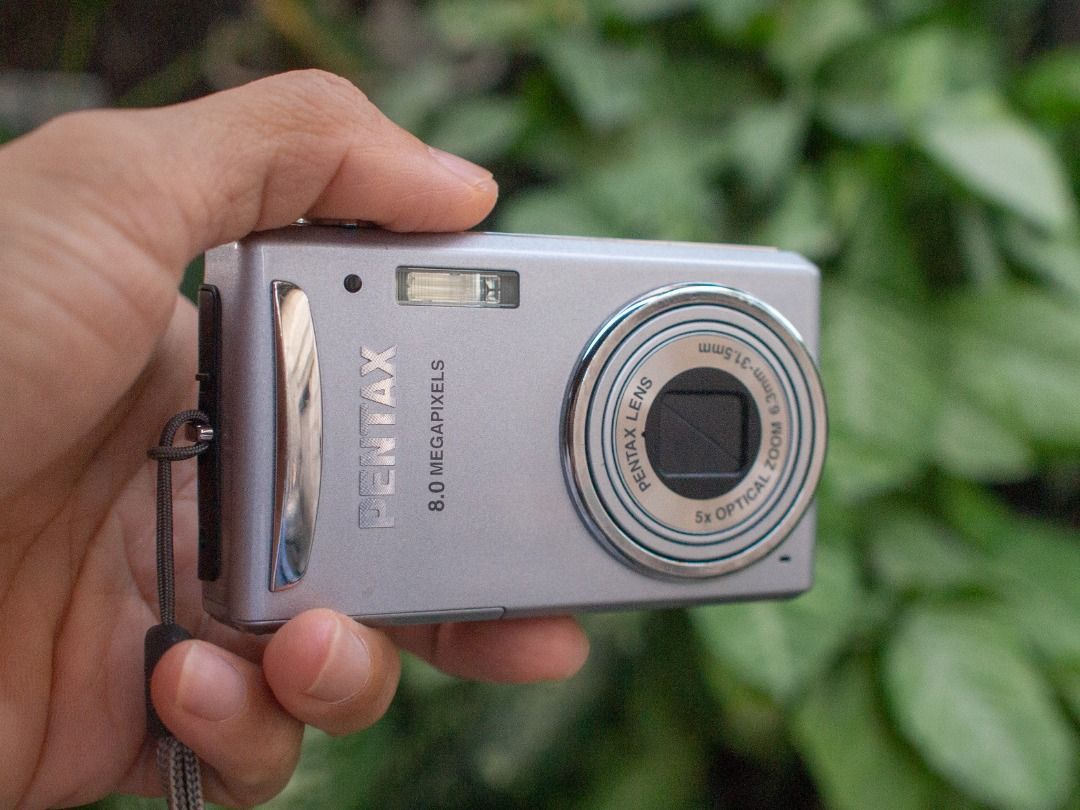 Pentax Optio V20 Digital Camera Digicam (Category: Cameras) located in Arayat. Submitted by josepdg (Listing ID 1282139404, Image 3). Description: 8MP CCD Digital Camera What's Included; -Camera with Strap -Battery (used) -Universal Clip Charger *This is a used item so please expect some scratches, scuffs, and imperfections on the camera body. ISSUE; -The camera has a persistent banding issue that can affect photos, see sample attached. The condi