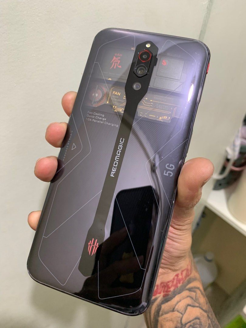 ZTE Nubia Red Magic (Transparent ver) (Category: Android Others) located in Manila. Submitted by danielly23 (Listing ID 1282131941, Image 3). Description: For sale ZTE Red Magic 5g(Transparent back) 12gb ram / 256 internal Minor dents only Very smooth in Hard games With built in fan. Unit only. 14k nego. Vito cruz Manila.