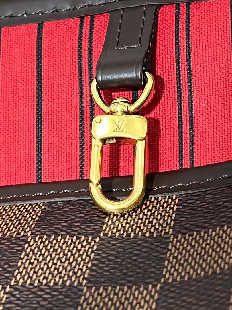 Authentic Louis Vuitton neverfull ebene MM microchip (Category: Luxury Bags & Wallets) located in Manila. Submitted by 2ndchancesale (Listing ID 1282331196, Image 3). Description: Lv neverfull mm new model with pouch (but not included with this item hence selling approx 40 percent off last know retail Microchip preowned like new with original receipt dec 2022 Used twice NO FLAWS whatsoever nothing to show , photos are unfiltered showing like new 