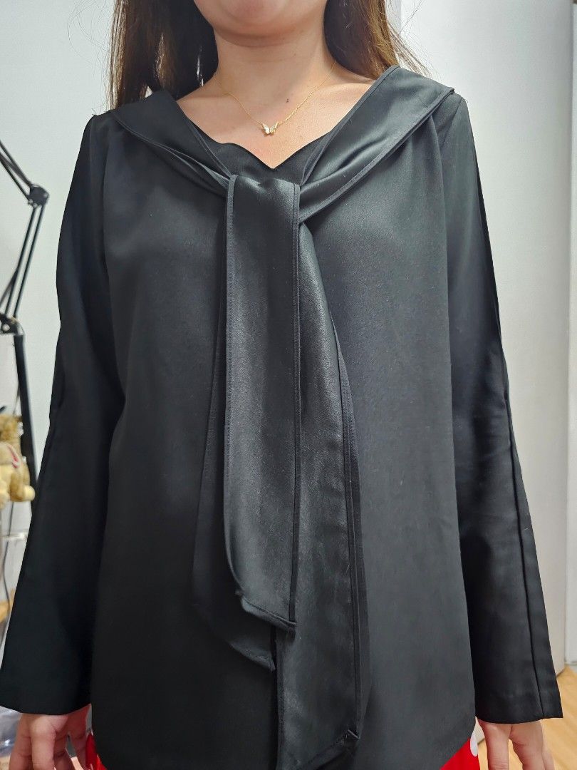 Black Formal Kashieca cold shoulder front tie top (Category: Longsleeves) located in Makati City. Submitted by s.mariae (Listing ID 1282345281, Image 3). Description: No flaws Good as new Versatile office/formal wear RFS: does not fit my mom anymore.