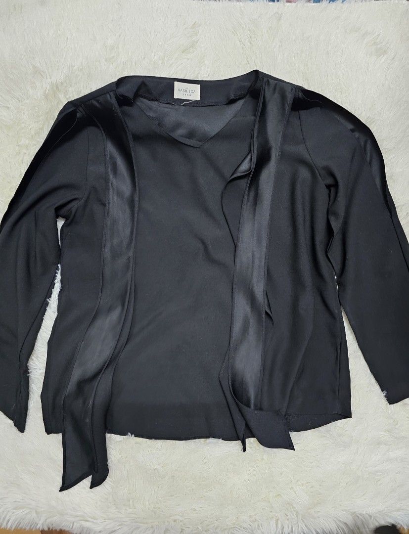 Black Formal Kashieca cold shoulder front tie top (Category: Longsleeves) located in Makati City. Submitted by s.mariae (Listing ID 1282345281, Image 1). Description: No flaws Good as new Versatile office/formal wear RFS: does not fit my mom anymore.