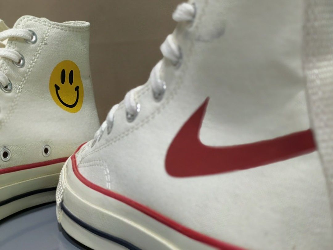 Chuck taylor nike swoosh hot sale