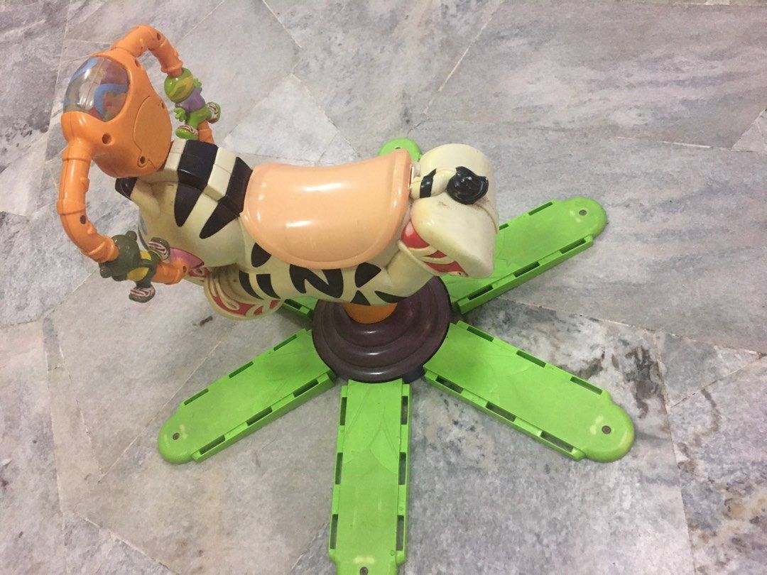 Bouncing zebra ride on toy top