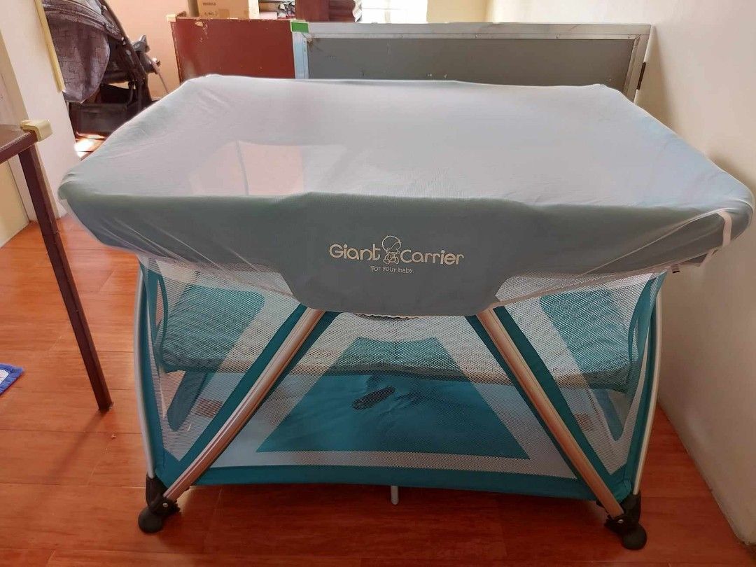 Giant Carrier Crib Playpen (Category: Cots & Cribs) located in Quezon City. Submitted by gailerica (Listing ID 1282358071, Image 2). Description: For Sale Giant Carrier Playpen, can be used as crib as well. Complete attachments, with box. Bought for 8K selling for only Php 4500 RFS: outgrown (baby is 2yrs old already) Pick up location: North Olympus, Caloocan City.