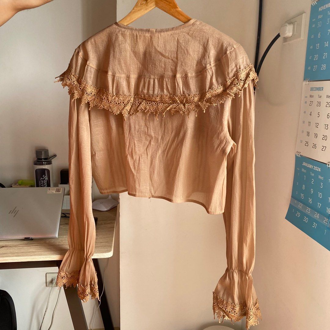 Light Brown/Beige Sheer Button-down Longsleeves with Lace (Category: Longsleeves) located in Manila. Submitted by bdgdeclutters (Listing ID 1282300277, Image 2). Description: Fits small to medium frames .