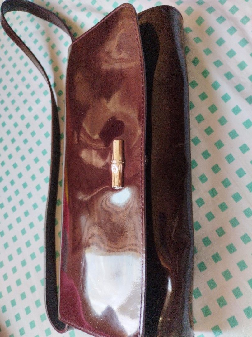 Longchamp Pochette patent leather bag (Category: Luxury Bags & Wallets) located in Santa Rosa. Submitted by leShoppe (Listing ID 1282245685, Image 1). Description: honest issue malagkit un feel Ng patent.kayo na bahala. authentic.