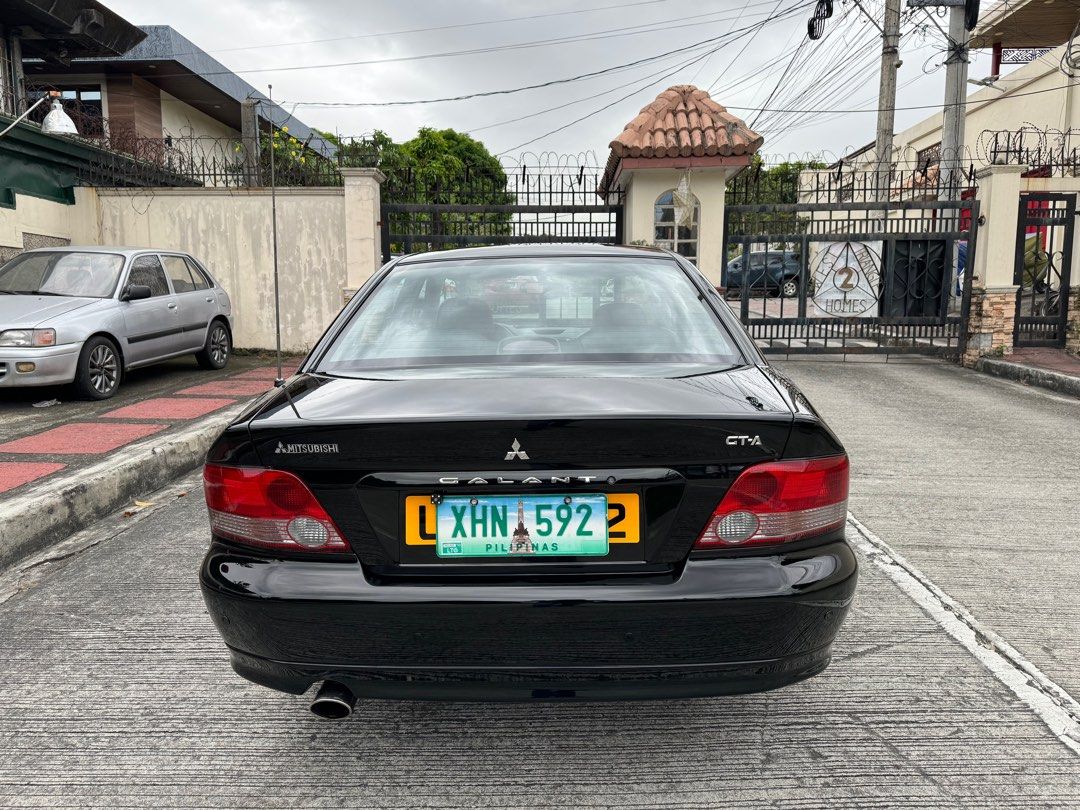 Mitsubishi Galant 2.0 GTA Auto (Category: Used Cars) located in Quezon City. Submitted by vincelf (Listing ID 1282219717, Image 3). Description: 2003 Mitsubishi Galant GTA 2.0Liters Gas Automatic Transmission All Original, Rare Color Black, 67TKM Only with ABS, Airbags Pioneer Touchscreen Head Unit Back-up Sensors + Camera Dual AC Climate Control OEM Momo Steering Leather Alcantara Power Seats Japan Mags + 4pc New Tires Very Fresh In & Out P358,0