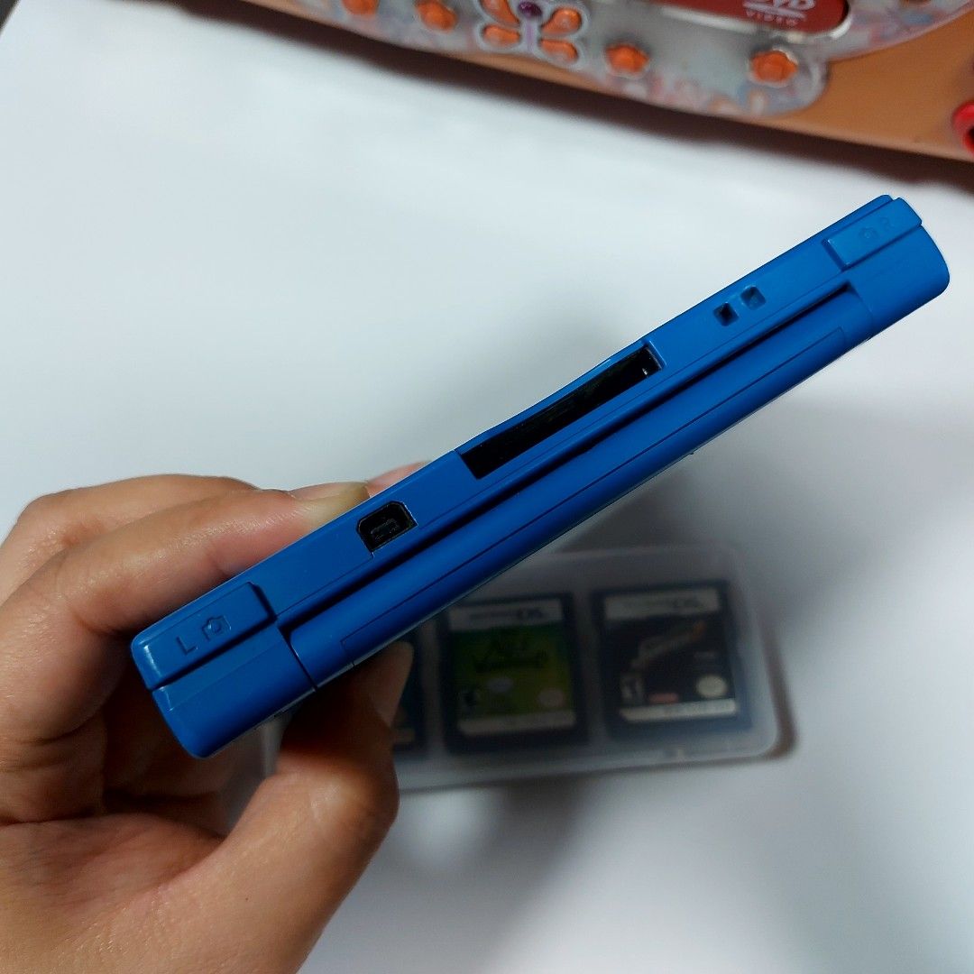 Nintendo DSi Matte Blue Bundle (Category: Nintendo) located in Manila. Submitted by watchesvideogamestoys (Listing ID 1282287269, Image 3). Description: 🛢FOR SALE🛢 🎮Nintendo DSi Matte Blue Bundle 🎮PhP3,500 📋Item Details: ✅️Unit is in good working condition ✅️All buttons are responsive ✅️Visible but minimal signs of use on the front and back case ✅️Both screens have no protectors attached ✅️Non CFW ✅️US Region ✅️8GB memory card ✅️Comes with U