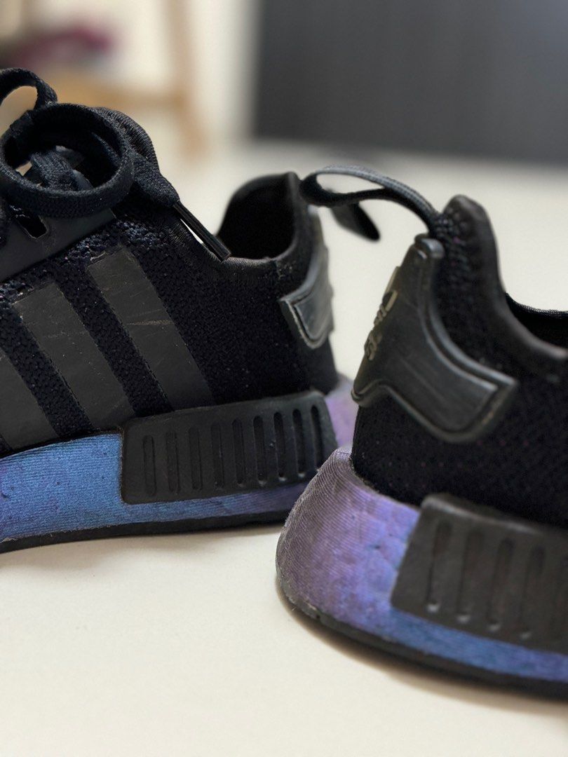 Nmd black female sales