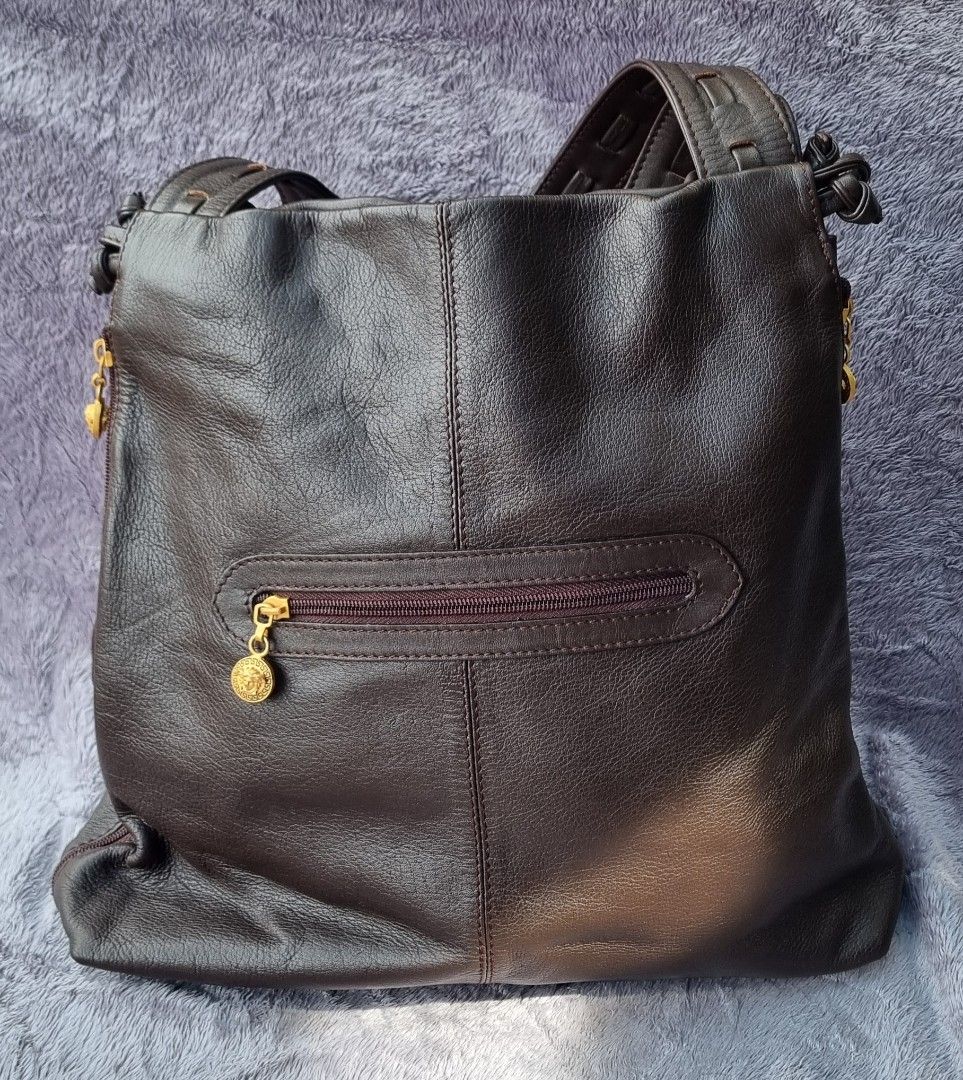 Original Vintage Gianni Versace Shoulder Bag (Category: Luxury Bags & Wallets) located in Talisay. Submitted by parchiracollection (Listing ID 1282271944, Image 2). Description: *small rubs at the bottom corners but barely noticeable *both sides are expandable *very pretty! *SIZE: H- 13 L- 13 W- 4 Handle drop - 9.5 inches *Please check photos before purchasing *plus Sf * This is a second-hand item, kaya wag po mag expect na BAGO *no to low baller