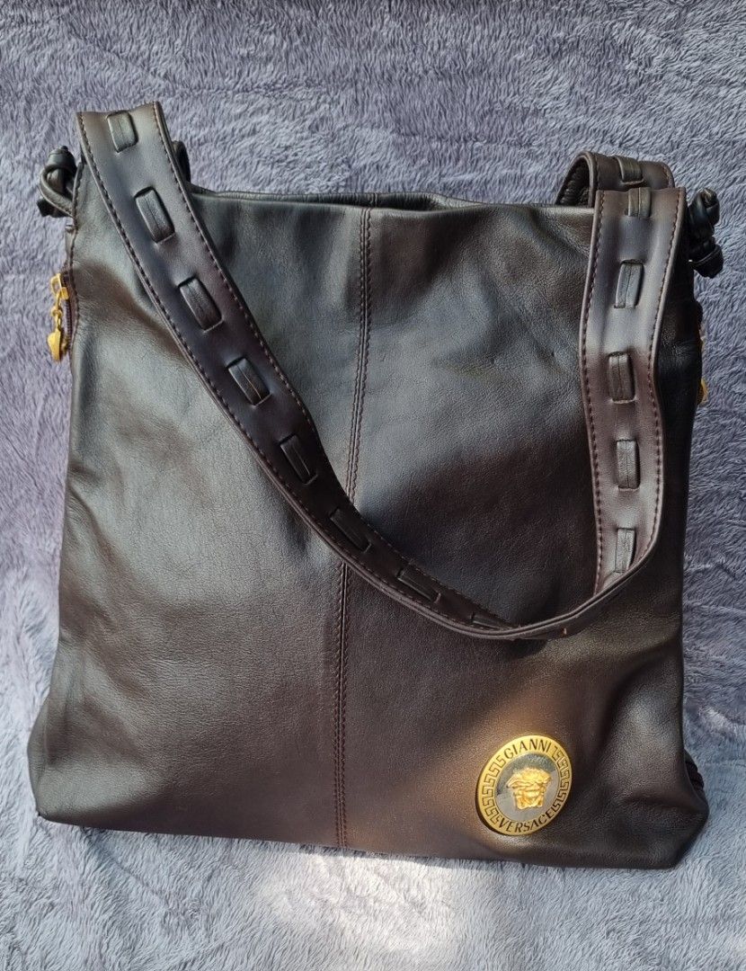 Original Vintage Gianni Versace Shoulder Bag (Category: Luxury Bags & Wallets) located in Talisay. Submitted by parchiracollection (Listing ID 1282271944, Image 1). Description: *small rubs at the bottom corners but barely noticeable *both sides are expandable *very pretty! *SIZE: H- 13 L- 13 W- 4 Handle drop - 9.5 inches *Please check photos before purchasing *plus Sf * This is a second-hand item, kaya wag po mag expect na BAGO *no to low baller