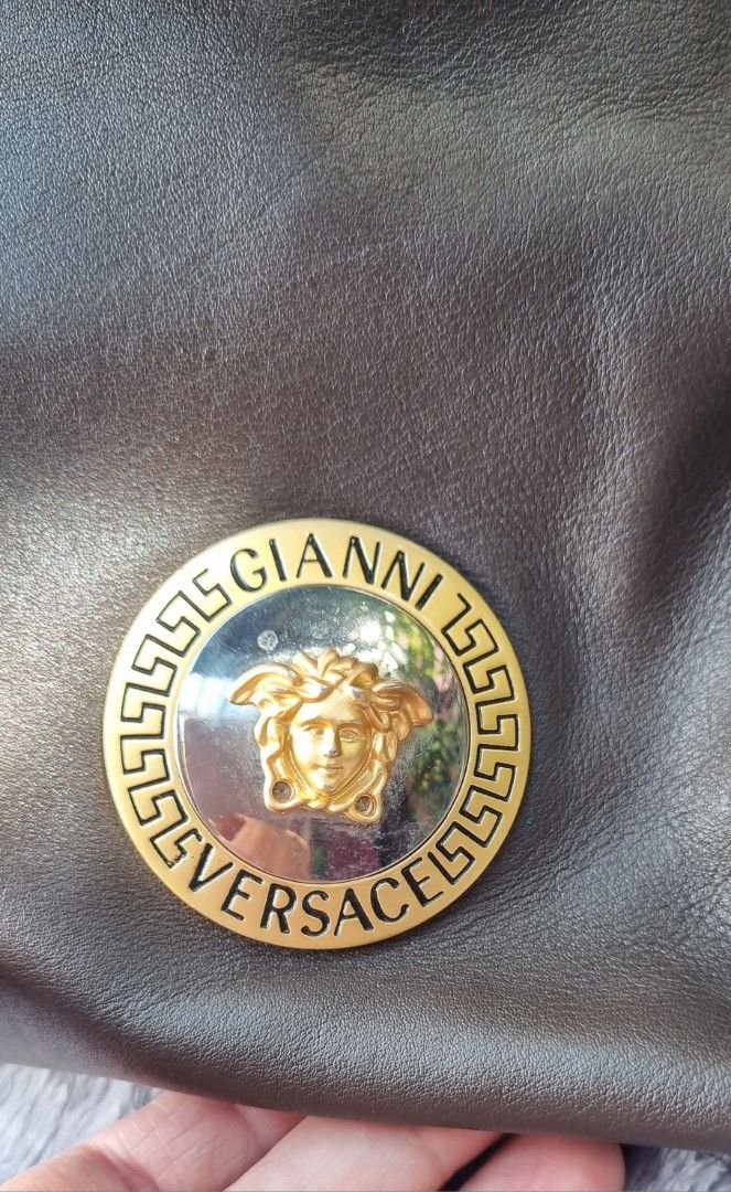 Original Vintage Gianni Versace Shoulder Bag (Category: Luxury Bags & Wallets) located in Talisay. Submitted by parchiracollection (Listing ID 1282271944, Image 3). Description: *small rubs at the bottom corners but barely noticeable *both sides are expandable *very pretty! *SIZE: H- 13 L- 13 W- 4 Handle drop - 9.5 inches *Please check photos before purchasing *plus Sf * This is a second-hand item, kaya wag po mag expect na BAGO *no to low baller