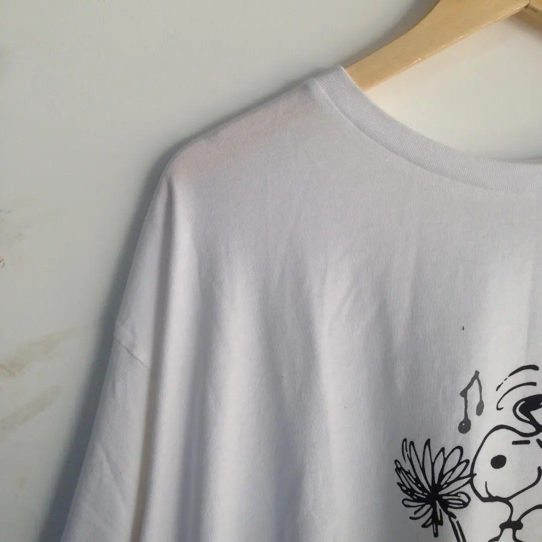 UNIQLO X PEANUT white shirt (Category: Shirts) located in San Fernando. Submitted by hellokteesph (Listing ID 1282293573, Image 3). Description: Uniqlo x peanut 3XL on tag.