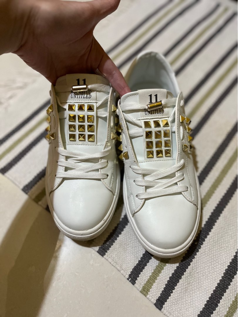 White sneakers with gold best sale studs