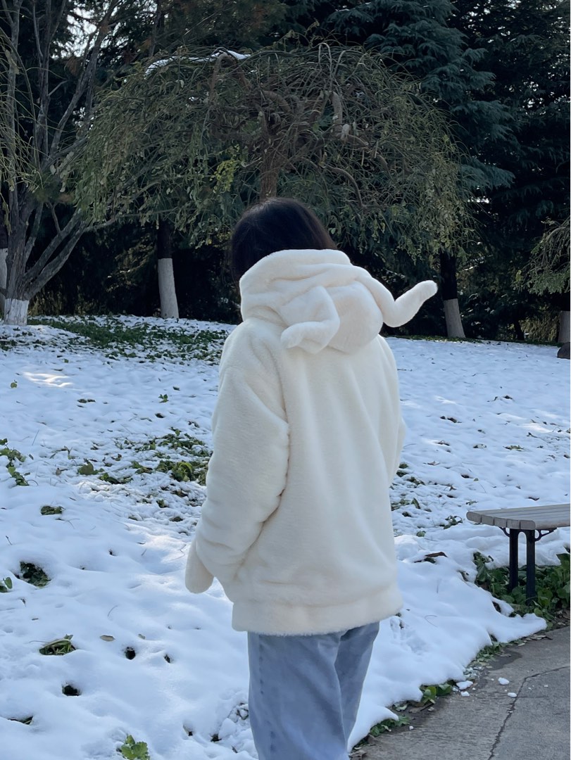 White coat top with fluffy hood