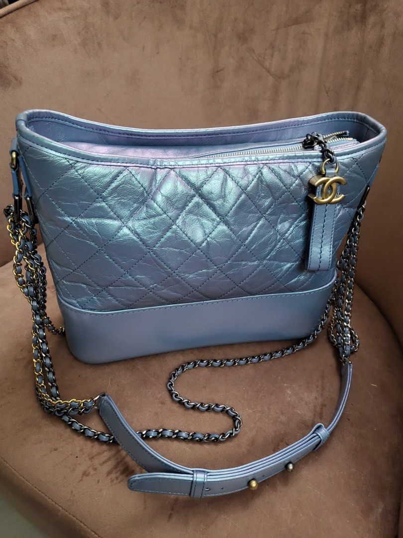 Authentic Chanel Gabrielle Medium Size (On Sale - Layaway Ready) (Category: Luxury Bags & Wallets) located in Rizal. Submitted by SummerPeaCloset (Listing ID 1281801042, Image 2). Description: With original dustbag Series 28 Light Blue Shimmer Aged Leather Rare find ❤️ In good condition Selling low for Php 170,000 With slight imperfection (on one side) as shown on the last photo, hence lowered price (can easily be retouched) #2024declutter.