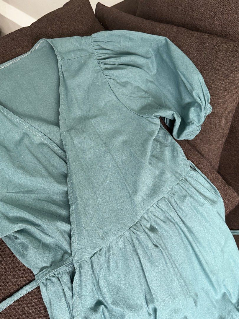 Blue Wrap Around Puff Sleeve Dress (Category: Dresses) located in Quezon City. Submitted by cm.abej (Listing ID 1282431224, Image 1). Description: Brand new. Fitted once only. Size: Best fit medium to semi-large Best for casual or semi-formal events 👗✨.