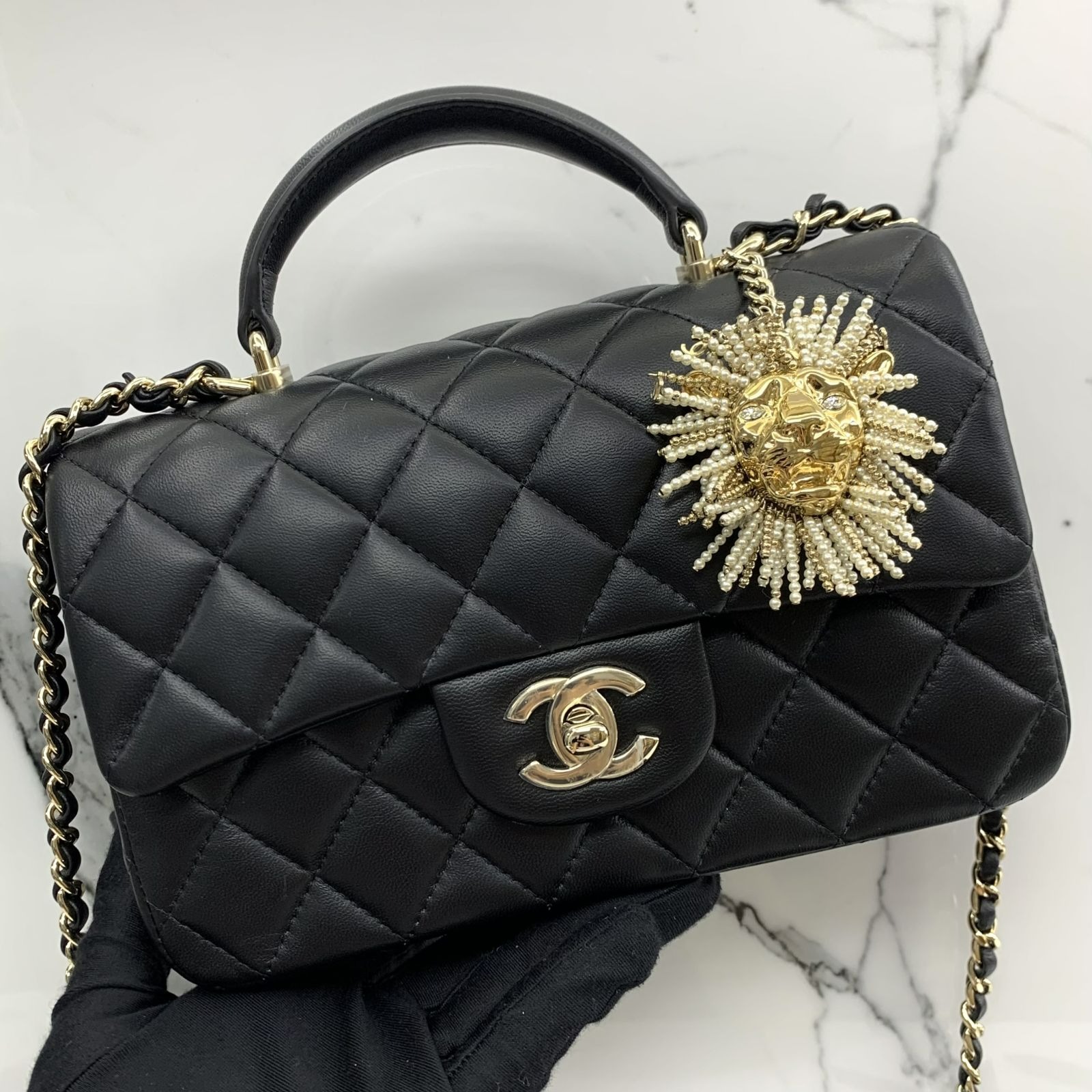 Chanel flap bag best sale with top handle review