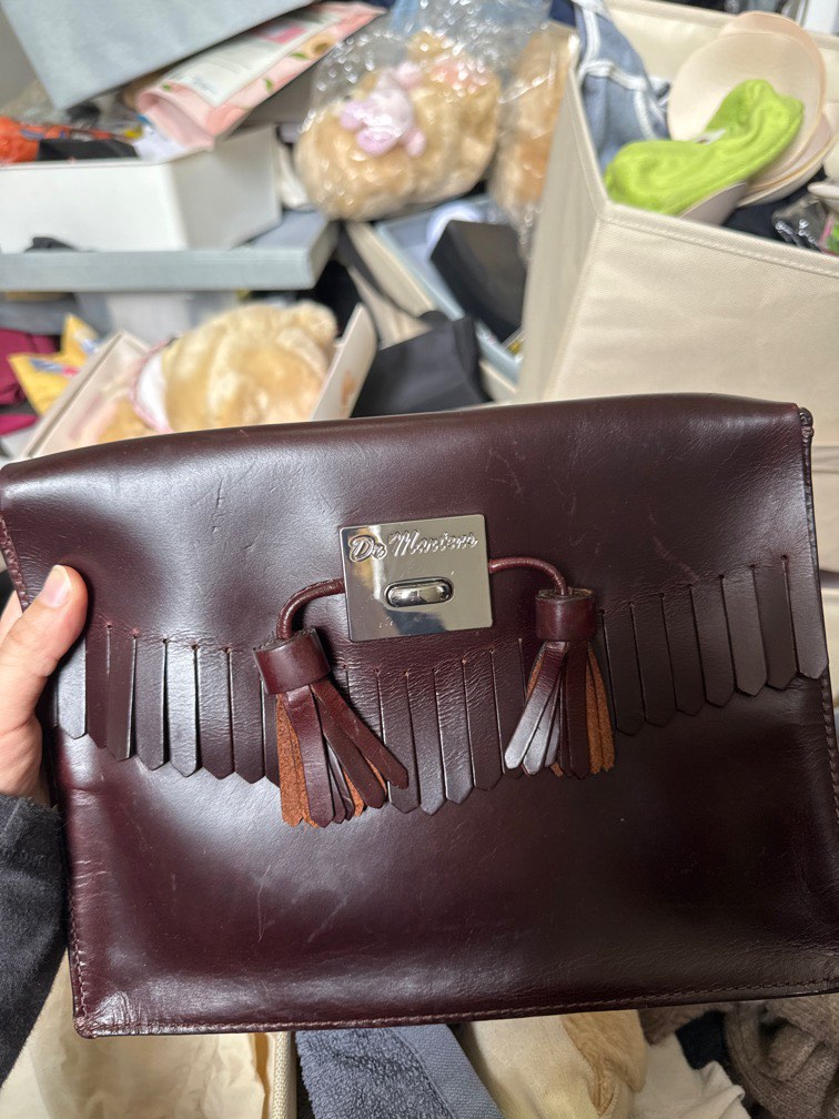 Dr martens clutch best sale bag
