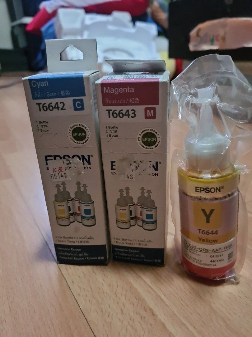Epson Printer Ink (Category: Printers, Scanners & Copiers) located in Singapore. Submitted by armanishade_gmail (Listing ID 1282502821, Image 1). Description: Cyan T6642 Magenta T6643 Yellow T6644 1 for $8/ 3 for $20 FCFS, no reserve..