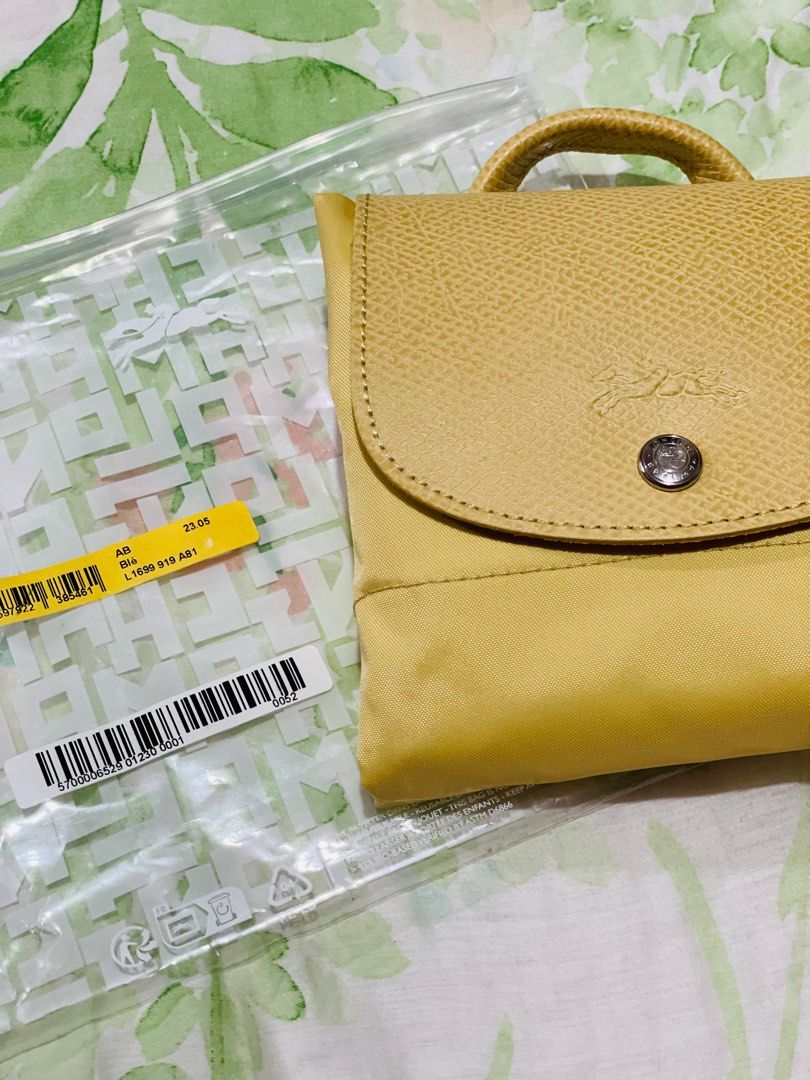 Longchamp Le Pliage Green Backpack Wheat (Category: Luxury Bags & Wallets) located in Dasmarinas. Submitted by berrylove_preloved (Listing ID 1282590696, Image 2). Description: .