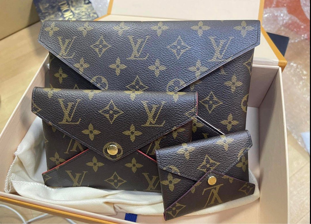 Louis Vitton Kirigami Pochette Monogram (Category: Luxury Bags & Wallets) located in Pasig City. Submitted by r.m.c2 (Listing ID 1282594333, Image 1). Description: The Pochette Kirigami is a 3-in-1 pouch composed of 3 individual envelopes Like New with Box and dust bag.